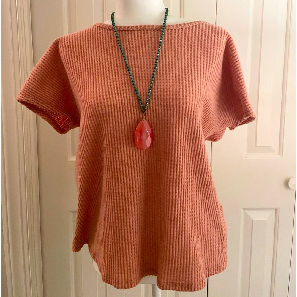 Cute slightly cropped top. Open back.